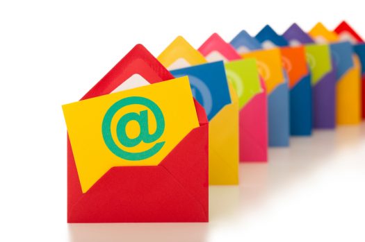 email symbol on row of colourful envelopes